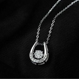 HORSESHOE LUCKY DANCEING DIAMOND NECKLACE